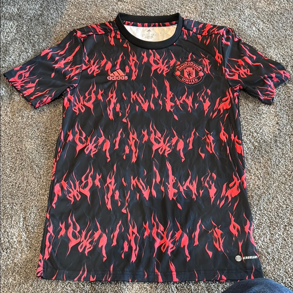 Manchester United  Red and Black Jersey with Bold Flame Design